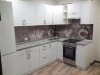 Красивая угловая кухня с древесными фасадами  фото 1 &mdash; Компания "Фишт Мебель"