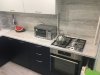 Кухня угловая с высокими шкафами под пленкой  фото 4 &mdash; Компания "Фишт Мебель"